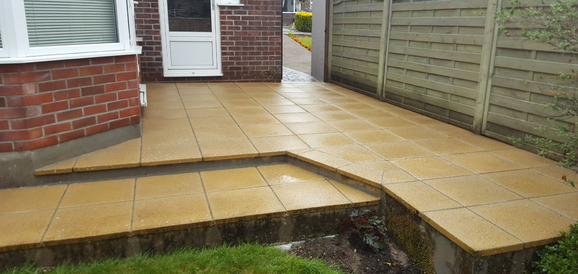 Stepped garden patio pressure washing before and after in Lymington - after