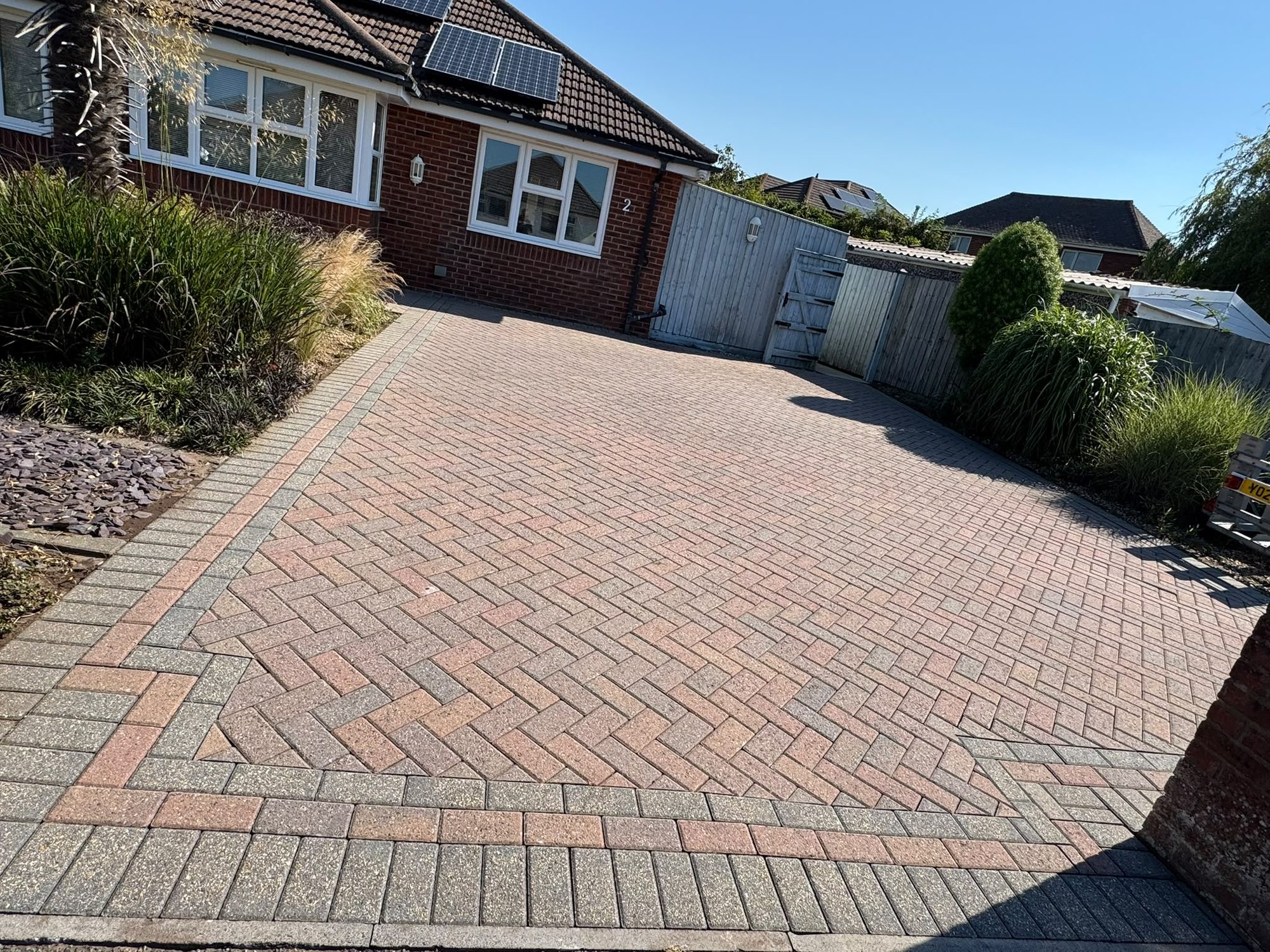 Block paving driveway after jet washing in Lymington