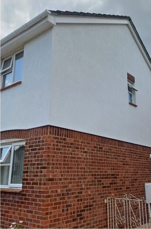 Render cleaning after, algae and staining removed in Lymington