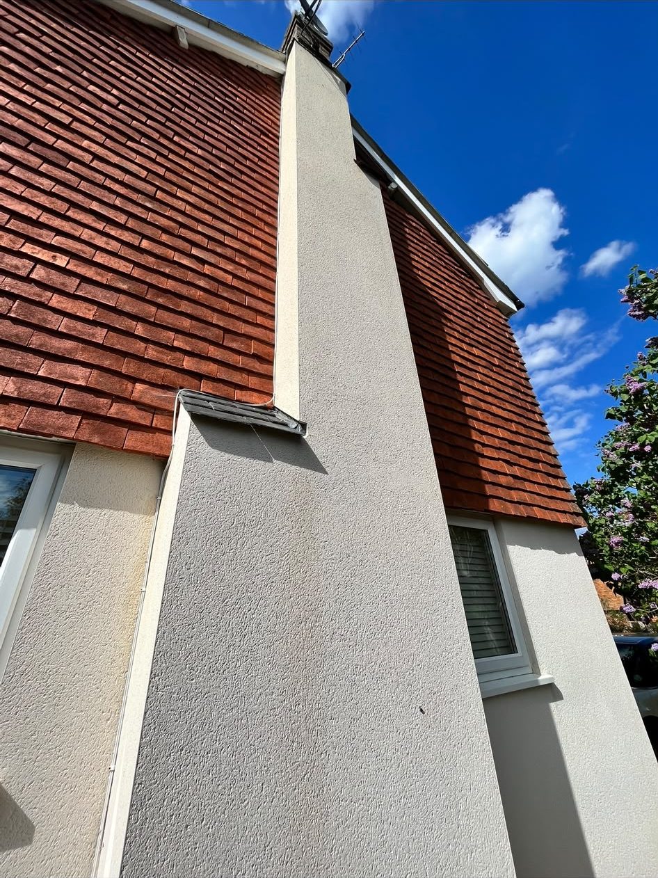 Rendered house wall after render cleaning in Lymington