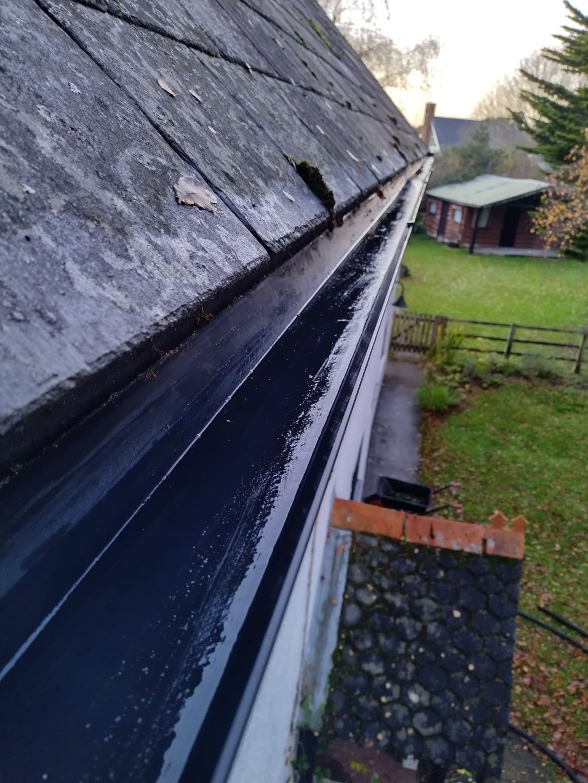 Gutter clearing before and after, leaves and debris removed from a blocked gutter in Lymington - after